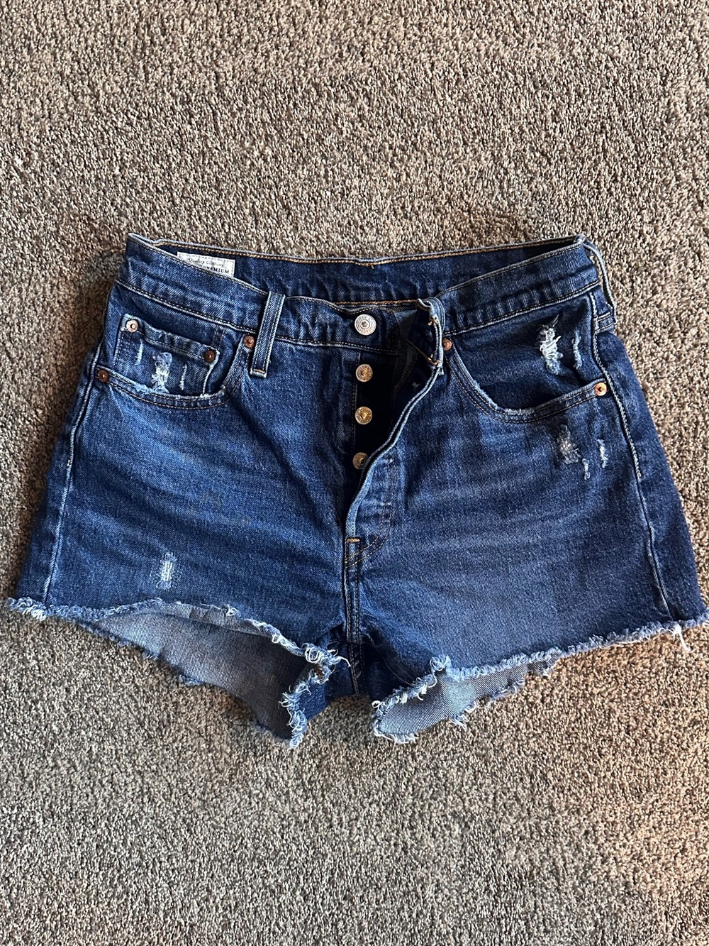 Levi’s High-Rise Dark Blue Distressed Denim Shorts
